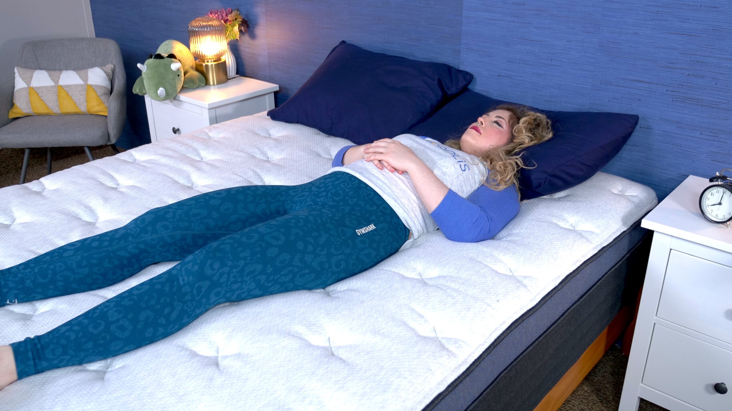 Nichole back sleeping on Helix Midnight Luxe