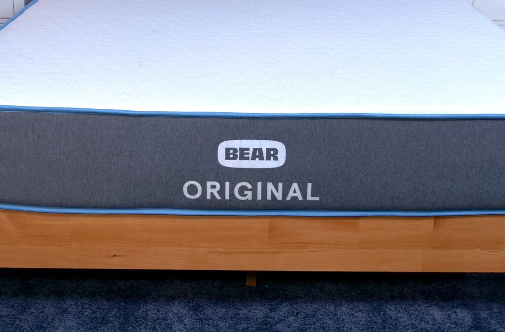 A closeup of the logo on the Bear Original mattress.