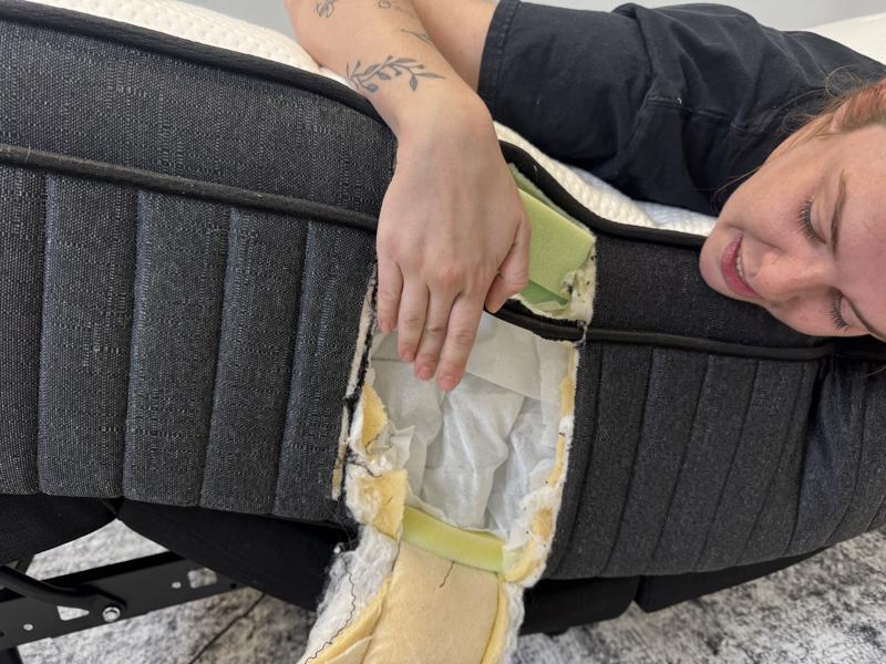 Our tester looks at the construction of a Titan Plus Luxe mattress.