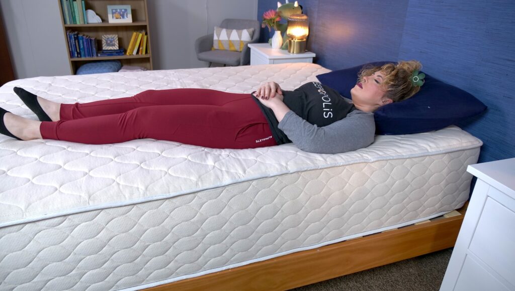 Nichole back sleeping on the WinkBeds EcoCloud Hybrid Mattress